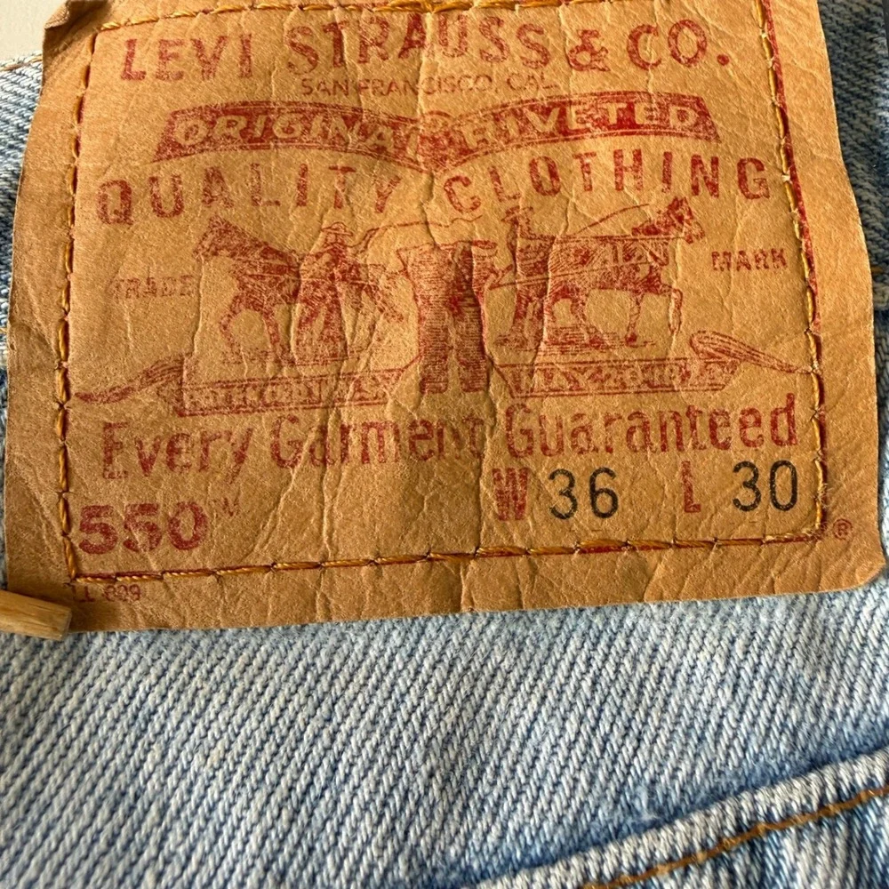 Vintage Levis 550 Relaxed Fit Tapered Leg Light Wash Jeans Made in USA 36x30